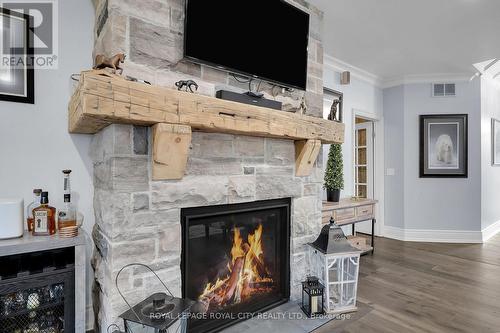 7 Fox Run Drive, Puslinch, ON - Indoor Photo Showing Living Room With Fireplace