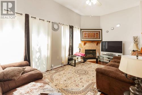 16 - 1995 Pinegrove Avenue, Pickering, ON - Indoor Photo Showing Living Room With Fireplace