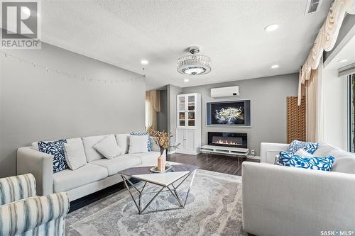 619 Kingsmere Boulevard, Saskatoon, SK - Indoor Photo Showing Living Room With Fireplace