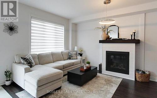 30 Autumn Drive, Wasaga Beach, ON - Indoor Photo Showing Living Room With Fireplace