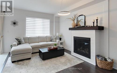 30 Autumn Drive, Wasaga Beach, ON - Indoor Photo Showing Living Room With Fireplace