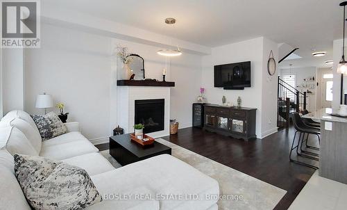 30 Autumn Drive, Wasaga Beach, ON - Indoor Photo Showing Living Room With Fireplace