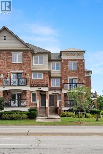 19 - 2551 Sixth Line, Oakville, ON - Outdoor With Balcony With Facade