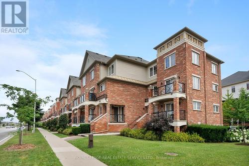 19 - 2551 Sixth Line, Oakville, ON - Outdoor With Balcony With Facade