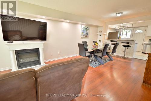 108 - 92 Stroud Crescent, London, ON - Indoor Photo Showing Living Room With Fireplace