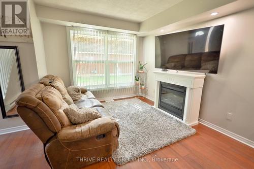 108 - 92 Stroud Crescent, London, ON - Indoor Photo Showing Living Room With Fireplace