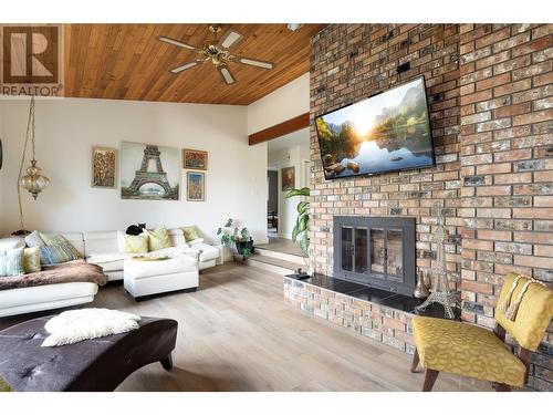 11047 Pretty Road, Lake Country, BC - Indoor Photo Showing Living Room With Fireplace