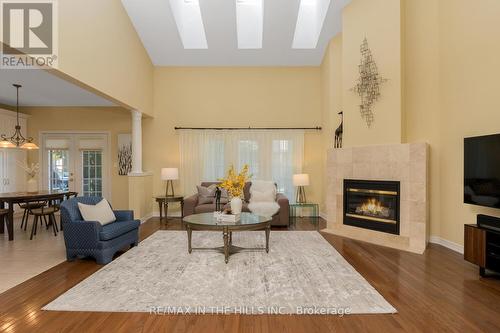 27 - 2165 Stavebank Road, Mississauga, ON - Indoor Photo Showing Living Room With Fireplace