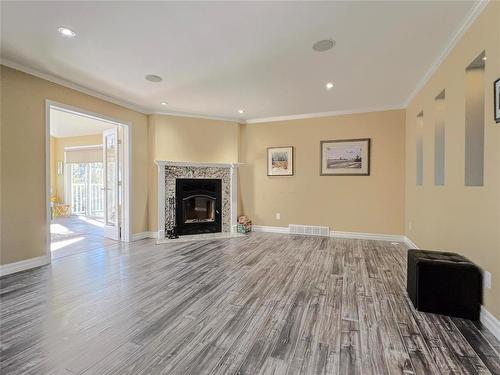 9 Robbies Drive, Carberry, MB - Indoor Photo Showing Living Room With Fireplace