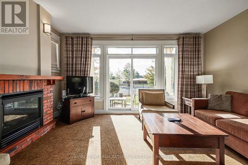 120 - 125 Fairway Court, Blue Mountains, ON - Indoor Photo Showing Living Room With Fireplace