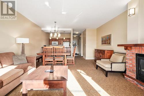 120 - 125 Fairway Court, Blue Mountains, ON - Indoor Photo Showing Living Room With Fireplace