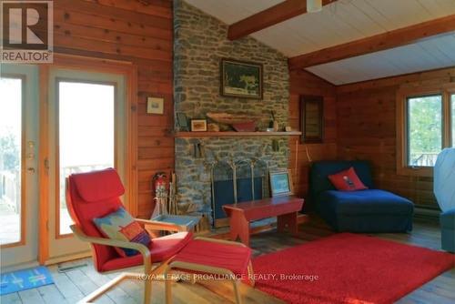 217 Cemetery Lane, Prince Edward County (North Marysburgh), ON - Indoor Photo Showing Living Room With Fireplace