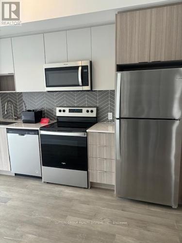 203 - 202 Burnhamthorpe Road, Mississauga, ON - Indoor Photo Showing Kitchen With Stainless Steel Kitchen