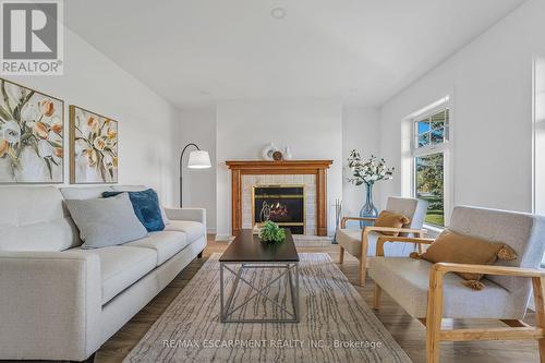 7580 Regional 20 Road, West Lincoln, ON - Indoor Photo Showing Living Room With Fireplace