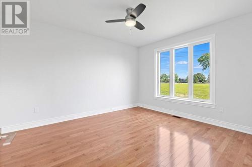 Primary bedroom with even more awesome hardwood floors - 9 Billings Avenue W, South Dundas, ON - Indoor Photo Showing Other Room