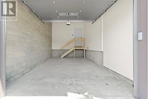 Garage interior also drywalled & insulated - 9 Billings Avenue W, South Dundas, ON - Indoor Photo Showing Garage