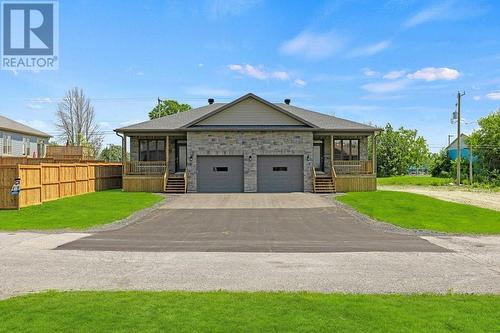 Exterior front with stone, James Hardie siding on balance - 9 Billings Avenue W, South Dundas, ON - Outdoor