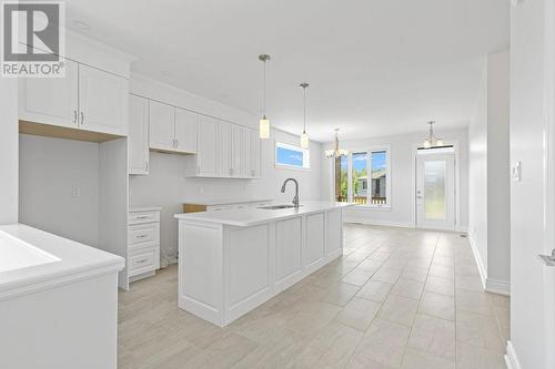 Kitchen/Dining area that extends towards front door. - 9 Billings Avenue W, South Dundas, ON - Indoor Photo Showing Kitchen