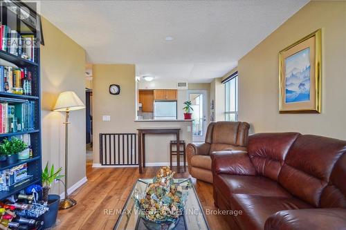 1112 - 4 Elsinore Path, Toronto, ON - Indoor Photo Showing Living Room