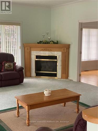 3 Steward Drive, South Dundas, ON - Indoor Photo Showing Living Room With Fireplace