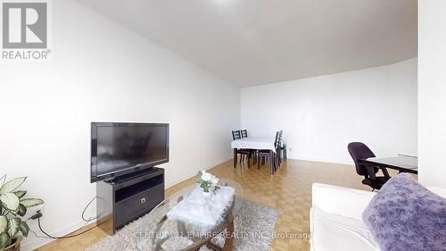 2001 - 4725 Sheppard Avenue E, Toronto, ON - Indoor Photo Showing Living Room