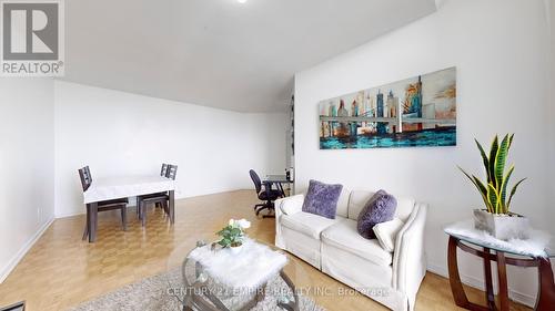 2001 - 4725 Sheppard Avenue E, Toronto, ON - Indoor Photo Showing Living Room