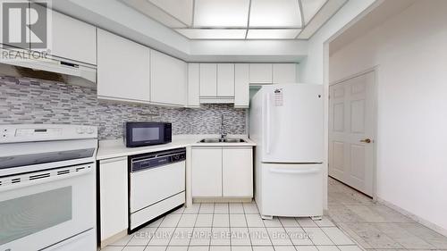 2001 - 4725 Sheppard Avenue E, Toronto, ON - Indoor Photo Showing Kitchen With Double Sink