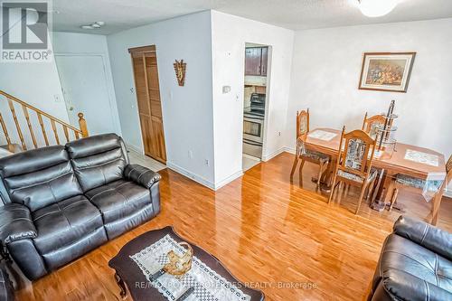 297 - 165 Cherokee Boulevard, Toronto, ON - Indoor Photo Showing Living Room