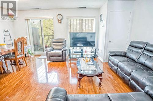 297 - 165 Cherokee Boulevard, Toronto, ON - Indoor Photo Showing Living Room