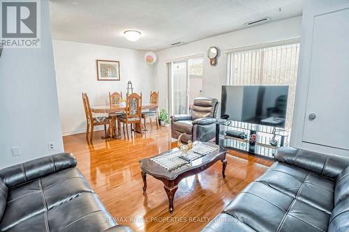 297 - 165 Cherokee Boulevard, Toronto, ON - Indoor Photo Showing Living Room