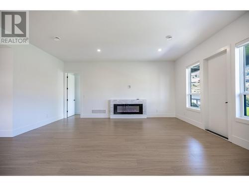 184 Holloway Drive, Kamloops, BC - Indoor Photo Showing Other Room With Fireplace