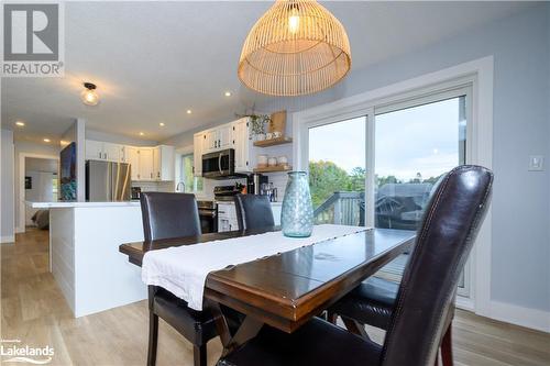 Open concept view from dining through kitchen - 185 South Fairy Lake Road, Huntsville, ON - Indoor Photo Showing Dining Room