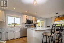 View of kitchen from living room entrance - 