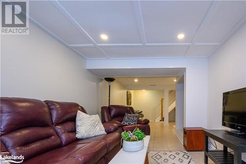 View of lower level In-Law suite living room from opposite end of room - 185 South Fairy Lake Road, Huntsville, ON - Indoor Photo Showing Other Room