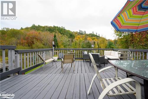 View into the yard and deck space - 185 South Fairy Lake Road, Huntsville, ON - Outdoor With Deck Patio Veranda With Exterior