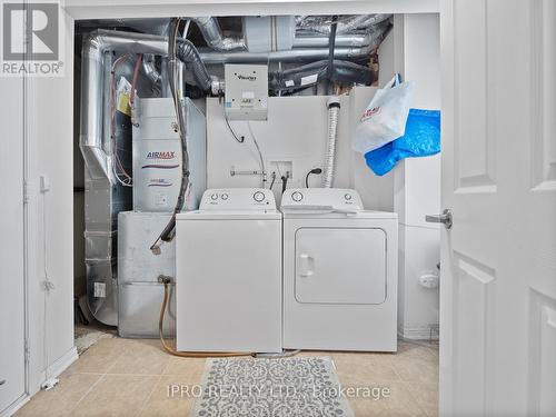 1 - 1025 Nadalin Heights, Milton, ON - Indoor Photo Showing Laundry Room