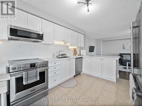 1 - 1025 Nadalin Heights, Milton, ON - Indoor Photo Showing Kitchen With Upgraded Kitchen