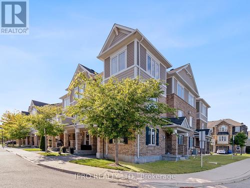 1 - 1025 Nadalin Heights, Milton, ON - Outdoor With Facade