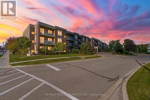 318 - 65 Via Rosedale, Brampton, ON - Outdoor With Facade