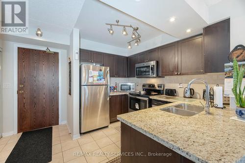 318 - 65 Via Rosedale, Brampton, ON - Indoor Photo Showing Kitchen With Double Sink With Upgraded Kitchen