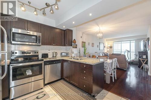 318 - 65 Via Rosedale, Brampton, ON - Indoor Photo Showing Kitchen With Double Sink With Upgraded Kitchen