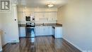 70 5601 Aerodrome Road, Regina, SK  - Indoor Photo Showing Kitchen With Double Sink 