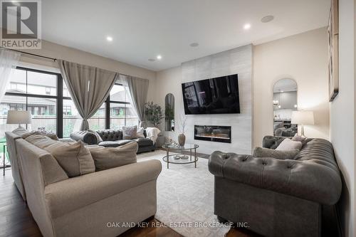 3520 Grand Oak Crossing E, London, ON - Indoor Photo Showing Living Room With Fireplace