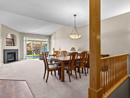 76-650 Harrington Rd, Kamloops, BC - Indoor Photo Showing Dining Room With Fireplace