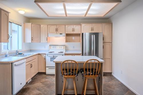 72-3333 South Main Street, Penticton, BC - Indoor Photo Showing Kitchen With Double Sink