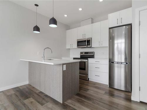 303-1515 Redfern St, Victoria, BC - Indoor Photo Showing Kitchen With Stainless Steel Kitchen With Upgraded Kitchen