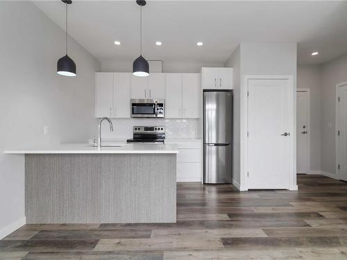 303-1515 Redfern St, Victoria, BC - Indoor Photo Showing Kitchen With Stainless Steel Kitchen With Upgraded Kitchen