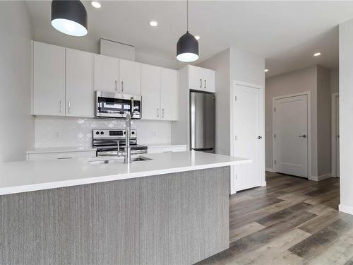 303-1515 Redfern St, Victoria, BC - Indoor Photo Showing Kitchen With Stainless Steel Kitchen With Double Sink