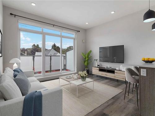 303-1515 Redfern St, Victoria, BC - Indoor Photo Showing Living Room