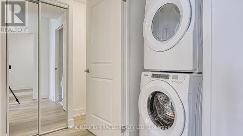 801 - 202 Burnhamthorpe Road E, Mississauga, ON - Indoor Photo Showing Laundry Room